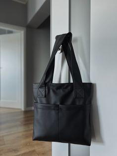 Vegan Leather Bag Metallic Black - our absolute hit ❤️ Its unique design makes it stand out from other exclusive bags 👜 In addition, the perfectly designed interior allows for the perfect arrangement of all the necessary things, which makes life easier and allows you to enjoy every moment to the fullest! ✅- waterproof eco leather shopper💧 ✅- closes with a zipper ✅- the two outer pockets also close with a zip ✅- convenient organization inside the bag, additionally it has three pockets ✅- capacious, easily fits a 15.6-inch laptop 💻 ✅- stands out from other stylish handbags Dimensions: - Width: 42 cm - Height: 38 cm - Depth: 8 cm - Handles: 70 cm 👌Fit A4 format.👌 🤗 Material and care: Sealed and waterproof eco-leather (surface: 100% polyurethane / base fabric: 80% cotton, 20% polyester) Black Minimalist Daily Shoulder Bag, Black Minimalist Everyday Shoulder Bag, Black Everyday Minimalist Shoulder Bag, Shopping Tote Shoulder Bag With Laptop Sleeve, Tote Shoulder Bag With Laptop Sleeve For Shopping, Black Leather-handled Laptop Tote Bag, Black Tote Bag With Laptop Sleeve, Black Leather-handled Tote Laptop Bag, Minimalist Black Tote Laptop Bag