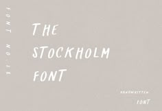 an old fashioned font that is in the style of stockholm, on a gray background