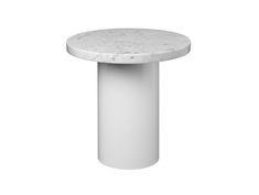 a white table with a marble top on a white background in front of a white backdrop