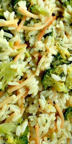 broccoli and rice salad with carrots on a white plate, ready to be eaten