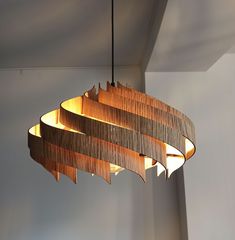 a wooden chandelier hanging from the ceiling