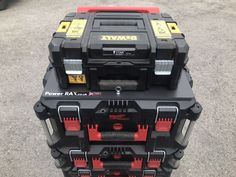 a stack of tool boxes sitting on top of each other