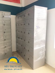 there are many mail boxes in the room