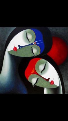 two people with their faces painted in blue, red and grey colors are facing each other