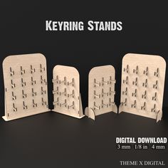 three wooden stands with numbers on them and the words keying stands in white ink