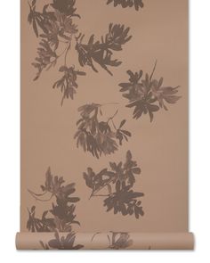 the wall paper has black leaves on it