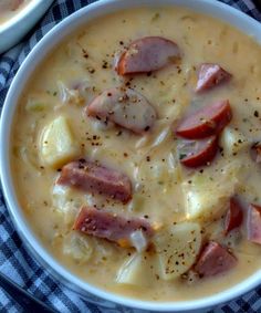 two bowls of soup with ham and potatoes