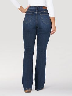 CELEBRATED STYLE STAPLE Few silhouettes are as celebrated as the Wrangler® bootcut. These women's bootcut jeans feature a hip-hugging high rise that flatters your figure while providing the perfect amount of coverage to keep you comfortable through the day. Their contoured waistband allows the style to sit higher in the back for less gaping while the timeless bootcut jeans offer a versatile look you can dress up or down to suit every occasion. With a leg opening that fits comfortably over combat High Waisted Bootcut Jeans, Blue Jeans For Women, Wrangler Jeans Women's, Women's Bootcut Jeans, Billionaires Club, Wardrobe Refresh, Womens Jeans Bootcut, Fall Fits, Jeans For Short Women