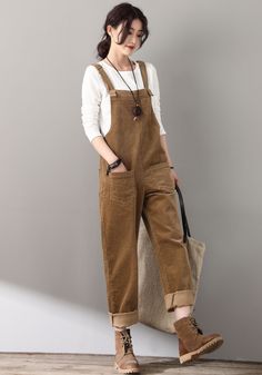 "The womens classic corduroy overalls with baggy straight leg fit. Traditional style with two pockets in front. ★★Feature 60% Cotton, Corduroy Medium Weight，Comfortable, Breathable Suit for Spring,Autumn, Winter Fabric swatch https://etsy.me/3rDEGCJ Size Chart https://etsy.me/3skS1Aq More Overalls /Jumpsuits From Ylistyle https://etsy.me/3B2exkH ★★ Model size Height approx 170 cm (5′ 7″) Bust 84 cm (33\") Waist 66 cm (26\") waist. She wears size XS ★★Bespoke Order Service If you Request other co Custom Jumpsuit, Brown Overalls, Long Wool Coat Women, Overalls Outfits, Retro Trousers, Womens Overalls, Overalls Plus Size, Green Wool Coat, Overalls Casual