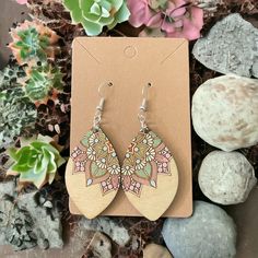 Almond shaped engraved wooden earrings featuring intricate mandala design, hand painted with soft pastel colors.  Earrings feature hypoallergenic silver plated hooks. Wood Mandala, Mandala Jewelry, Painted Mandala