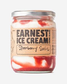 a jar of strawberry swirl ice cream on a white background