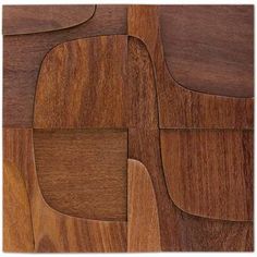 a close up view of the wood grain pattern on a table top, which has been cut into squares and rectangles