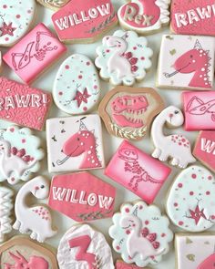 decorated cookies are arranged in the shape of letters and numbers for girls'birthdays