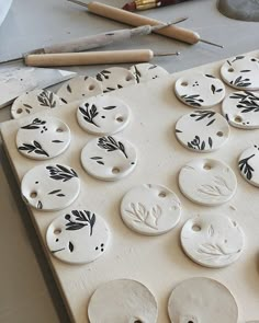 several ceramic buttons are sitting on a table