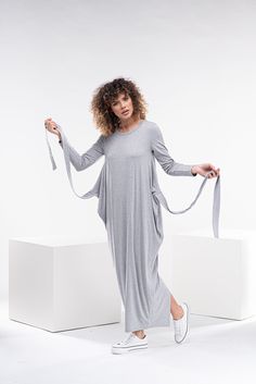 "This convertible cotton dress is a casual yet stylish model. Super comfortable and easy you can wear the design different waist. The long side ties can be wrapped in the front or in the back. Made from soft viscose fabric, this maxi dress is suitable for all seasons. The model in the picture is 176cm. ⅼ 5.8 ft. tall and is wearing size S / color: Light Grey 🌟 INFO: * Worldwide EXPRESS shipping - please provide a phone number for shipping documents * US Sizing XS to 4XL - size chart available b Avant Garde, Avant Garde Dress, Plus Size Ball Gown, Avant Garde Dresses, Multiway Dress, Maxi Dress Plus Size, Multi Way Dress, Maxi Dress Summer, Blue Velvet Dress