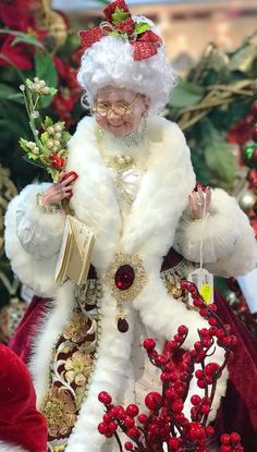 a christmas display with santa claus and other holiday decorations