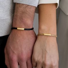 Matching Bracelet Set for Couples. His and Hers Bracelets. Introducing our exquisite double-strand silk band bracelet for couples, perfect for expressing your love and devotion. Crafted with attention to detail, this bracelet set features a stunning gold plated stainless steel engraving rectangular tube as its centerpiece. Each set includes two bracelets - the men will receive the sleek and sophisticated black band, while the women will receive the elegant and timeless beige band. Adorn your wri His And Hers Bracelets, Bracelet For Couples, Bracelet Anniversary, Couples Jewelry, Anniversary Boyfriend, Matching Couple Bracelets, Bracelet Matching, Bracelet Couple, Personalized Matches