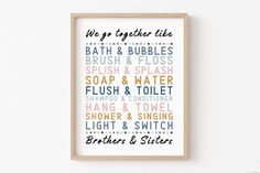 a framed poster with the words we go together like bath and bubbles, brush & floss, soap and water, flush and toilet, shampooi