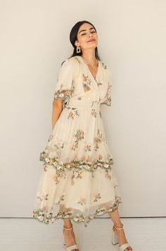 Eleanor Ivory Embroidered Tiered Dress- Restocked Garden Chic Wedding Attire Guest, Flowy Tiered Skirt Dress With Floral Embroidery, Dress For Anniversary, Embroidered Dress Designs, Wedding Guest Floral Dress, Tiered Dress With Floral Embroidery, Ivory Dress Outfit, Cottagecore Beige Dress With Floral Embroidery, Tea Dress Outfit