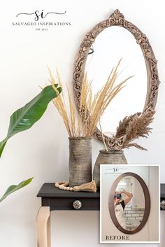 there is a mirror and some plants on the table