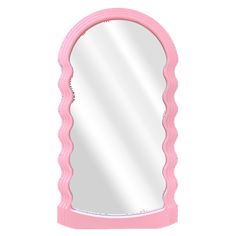 a pink mirror sitting on top of a white wall