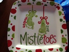 a white plate with green and red designs on it that reads mistetos 4 minutes ago from secret stooes net