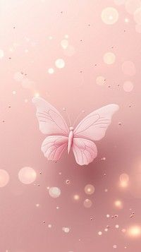 a pink butterfly flying in the air with boket around it's wings