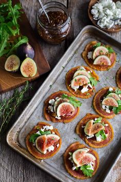 an image of food on a baking sheet with a video showing how to make figs