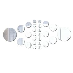 several mirrors are arranged in the shape of circles