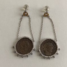 Coomi Silver With Diamonds Coin Drop Earrings. New But No Tags Silver Coin Pendant Earrings, Handmade Coin-shaped Sterling Silver Necklace, Silver Coin-shaped Metal Necklaces, Nickel-free Sterling Silver Coin Earrings, Nickel-free Coin-shaped Sterling Silver Earrings, Jewelry Earrings, Women Jewelry, Drop Earrings, Silver