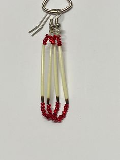 "Very simple single strand 2 1/2\" drop earrings with red beads and porcupine quills. They have a fishhook back." Native American Beaded Earrings With Quills, Quill Earrings Porcupine, Porcupine Quill Earrings Native Americans, Porcupine Quill Jewelry, Native American Beaded Earrings Inspire Uplift ⭐, Porcupine Quills, Ribbon Shirt, Red Bead, Fish Hook