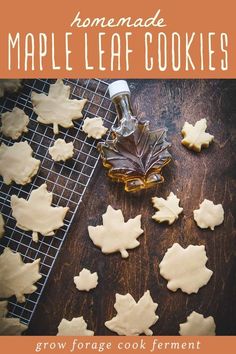 an image of maple leaf cookies on a wooden table with the words maple leaf cookies