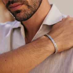 The Maharani Beaded Silver Men’s Cuff Bracelet is a modern piece of jewellery with traditional Indian detailing. Hand-crafted in solid silver, this narrow cuff bracelet features a unique adjustable design that you can modify for the perfect fit and decorative silver beading that stands out beautifully on the wrist. Thanks to its minimalist design, this Open Cuff Silver Bracelet appeals to men of all ages, even those who do not typically wear jewellery. It’s the perfect gift for birthdays, annive Unique Silver Kada For Men, Mens Silver Bangle, Mens Sterling Silver Bracelets, Adjustable Silver Bracelet, Silver Bracelet Designs, Mens Bracelet Designs, Mens Cuff Bracelets, Open Bracelet, Charlotte's Web