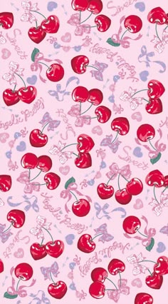 a pink background with cherries on it