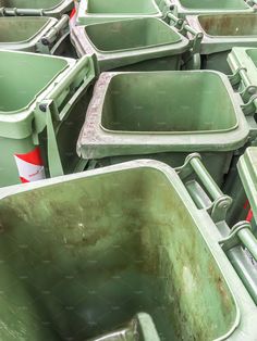 rows of green plastic seats sitting next to each other