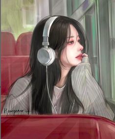 a woman with headphones sitting on a bus