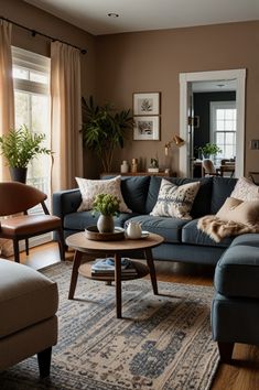 a living room filled with furniture and lots of pillows on top of it's couches