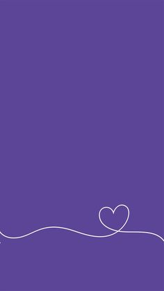 a purple wall with a white heart on it