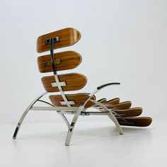 a chair made out of wood and metal