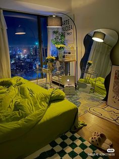 a bedroom with a large window and a green bed in the corner, next to a floor lamp