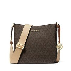 100% Authentic Michael Kors! Buy with confidence! * MSRP: $348.00 * Style: 35S4GTVC5B Features: * Zip Top Closure * Gold Toned Hardware * Michael Kors Logo At Front * Custom Fabric Lining * 1 Slip-in Pockets * Dimensions: 8.25"(L) X 8.25"(H) X 2.75"(D) * Strap: 18"-23" * Imported Please feel free to ask any questions. Happy shopping! Size: small.  Color: Brown.  Gender: female.  Age Group: adult. Leather Crossbody Bag Small, Michael Kors Crossbody Bag, Michael Kors Accessories, Signature Logo, Cloth Bags, Michael Kors Bag, Michael Kors Jet Set, Jet Set, Handbag Accessories