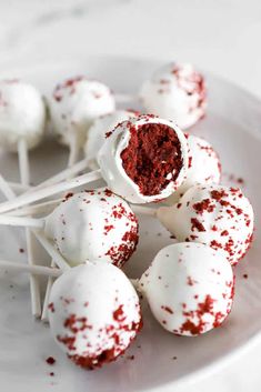 red velvet cake pops on a white plate