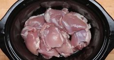 raw chicken in the slow cooker ready to cook