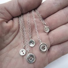 How sweet are these button necklaces! Loooove them. These would make your sewing friend's day! Button Necklaces, Button Jewellery, Button Necklace, Button Jewelry, Button Earrings, Funky Jewelry, Jewelry Lookbook, Silver Buttons, Jewelry Inspo