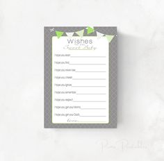 a baby shower game with green leaves on grey and white paper, which reads wishes