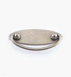 an oval metal handle on a white background