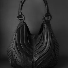 HYBRID HANDBAG - Make a Statement with Minimal Avant-garde Design and Xenomorph Aesthetics. Handcrafted with Vegetable-tanned Leather and Metal Accessories. Introducing our timeless BLACK LEATHER HANDBAG "HYBRID", the epitome of elegance and functionality. This Women Shoulder Bag crafted from genuine leather exudes sophistication and durability. Discover versatility in our Women Makeup Bag, suitable for your daily essentials. Embrace luxury and practicality with our Soft Leather Bag, perfect for Black Leather Handbag, Soft Leather Bag, Office Bag, Women Shoulder Bag, Women Makeup, Women Office, Leather Handbags Women, Vegan Leather Bag, Leather Satchel Bag