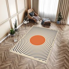 a living room with a chair and rug on the floor