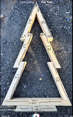 a wooden triangle with numbers on it