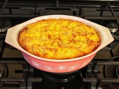 a casserole dish sitting on top of an oven